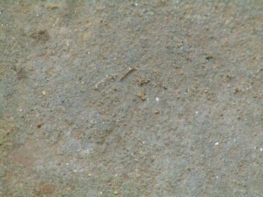 Yeryüzü tonlarının ve ince gradyanların bir karışımını yakalayan dokulu yüzey, fotoğrafçılık, grafik tasarımı veya dijital sunumlarda arka plan amaçları için mükemmel görsel olarak nötr bir zemin sağlıyor..