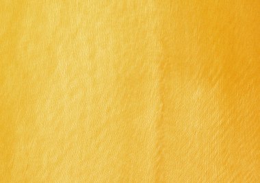 Sarı desenli arka plan sıkıntılı detaylar, sanatsal yüzey desenleri ve klasik ışıklandırma efektleri. Poster tasarımı, reklam, ambalaj, kitap kapakları ve web grafikleri için mükemmel..