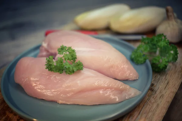 chicken breast, chicken fillet on a wooden table