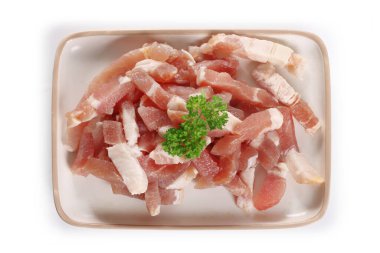 bacon bits on a white background, pork meat