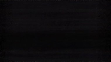 Siyah arka planda eski arızalar ve parazit sesleri. TV Gürültüsü Görüntüsü