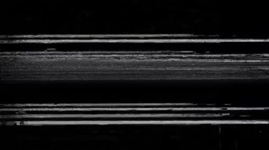 Siyah arka planda eski arızalar ve parazit sesleri. TV Gürültüsü Görüntüsü