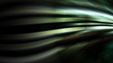 Karanlık uzayda çok renkli ışınlar hızla hareket ediyor