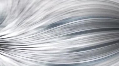 Beyaz ve siyah arkaplan. Resmin ortasında dalgalı iplikler ve kıvrımlar var.