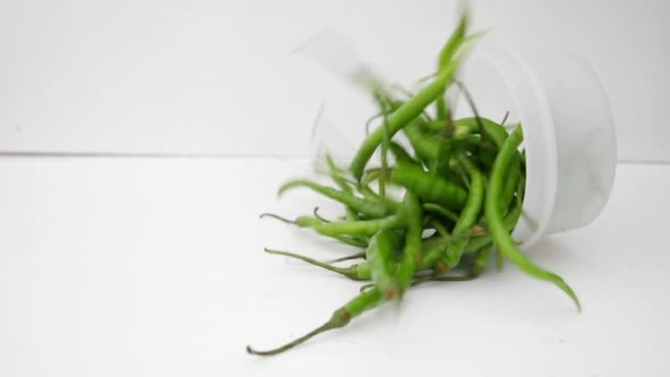 Falling Green Chilli Peper Bowl White Mattte — Stock video