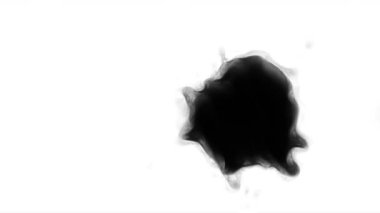 Kitle boyaları kağıt geçişi üzerine yayılır. En iyi kalite mürekkep lekesi animasyon stoku görüntüsü. Video geçişleri için bu görüntüyü kullanabilirsiniz.