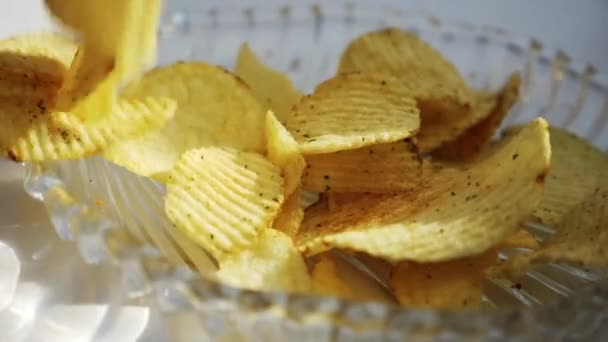Potato Chips Falling Glass Bowl — Stock Video