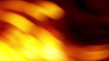 Kırmızı ve sarı arkaplanda bulanık arkaplanlı sarı bir nesne. Ateşe yakın.