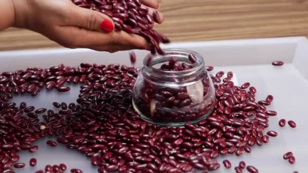 Jar Red Beans Cutting Board Woman Picking Beans — Stock Video
