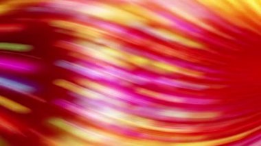 Bulanık bir hareketle kırmızı, sarı ve yeşil kıvrımlı