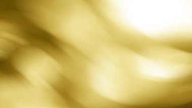 Ortasında parlak bir ışık olan bulanık sarı bir arka plan.