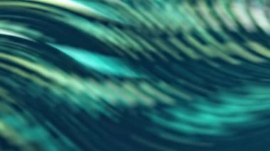 Dalga benzeri deseni olan yeşil ve mavi bulanık bir arkaplan