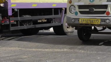 Unexpected Encounter - Two Trucks on a City Street