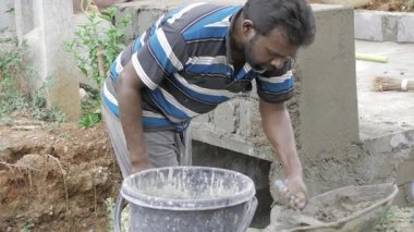 Determined Craftsman at Work - Ensuring Quality in Construction