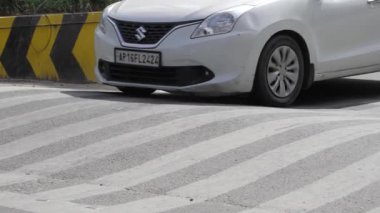 Suzuki Swift Awaiting Journey on Urban Asphalt