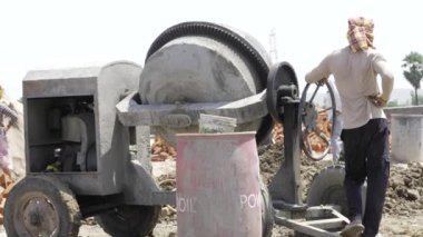Cement Mixer in Action - A Powerful Force of Construction