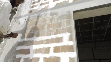 Efficient Plastering in Progress - Expert Work on Display