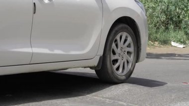 Striking the Street - A Moment with a White Car