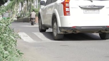 Urban Intersection - A White Car's Journey in the City