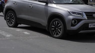 Urban Roadway Interaction - Car and Motorcycle on Street