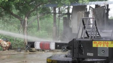 Bustling Industrial Splash - An Unseen Watery Whimsy