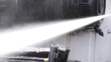 Efficient Pressure Washing in Action - Water Jet in Motion