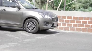 Safety First - A Silver Car's Journey Through the City Streets