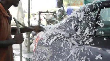 Efficient Auto Washing - A Thorough Wash in Progress