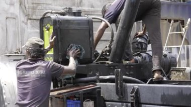 Energetic Maintenance Crew Ensuring Smooth Operations