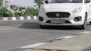 Urban Intersection - Car, Motorcycle, and Trees