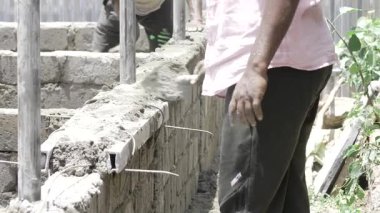 Efficient Bricklaying - A Master's Hand at Work