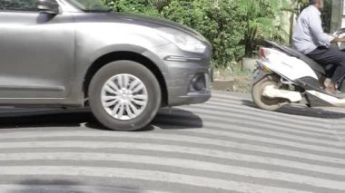 Scenic Intersection - Motorcycle and Car in Motion