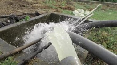 Water Leak Erupts from Underground Pipe - Emergency Response in Progress