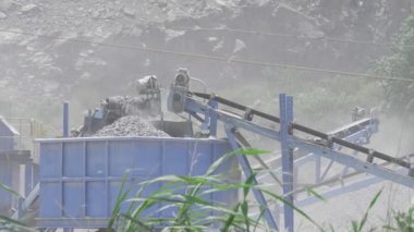 Powerful Rock Crushing Machine in Action - Efficient Quarrying Equipment