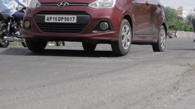 Safety First - A Red Hyundai's Journey on the Road