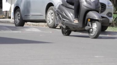 Scooter Meets Car - An Unexpected Roadside Rendezvous