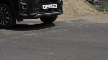 Urban Moment - A Black SUV's Journey on Asphalt