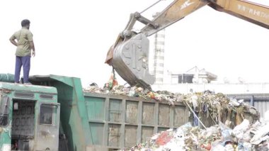 Efficient Trash Disposal - Handling Waste with Industrial Strength Equipment