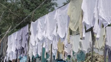 Colorful Laundry Line Under Blue Sky