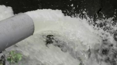 Vivid Water Eruption from Pipe - A Splash of Life