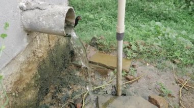 Water Pouring from a Hose - A Serenely Simple Sight