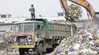 Garbage Truck Pickup - Collecting Trash for a Cleaner Tomorrow