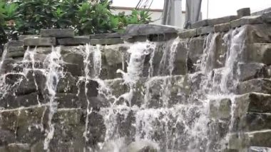 Contemplative Waters - A Serene Waterfall's Tranquil Glow