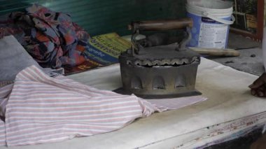 Unveiling the Ancient Art of Ironing - A Journey Through Time