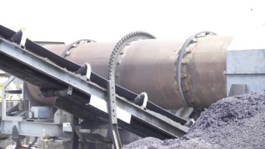 Industrial Cylinders with Chains and Hooks