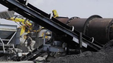 Efficient Industrial Operation - Two Heavy Machinery at Work