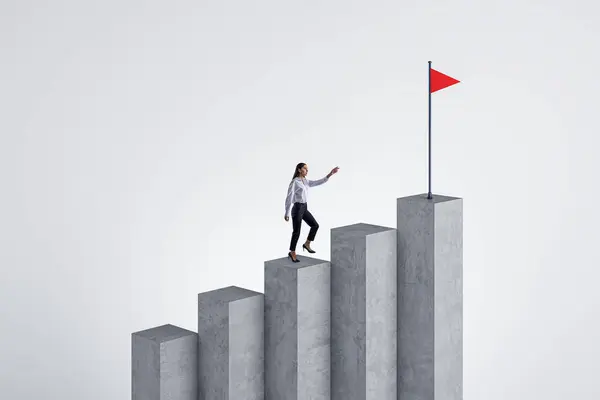 Woman climbing concrete business chart top with flag on white background. Success, financial growth and strategy concept