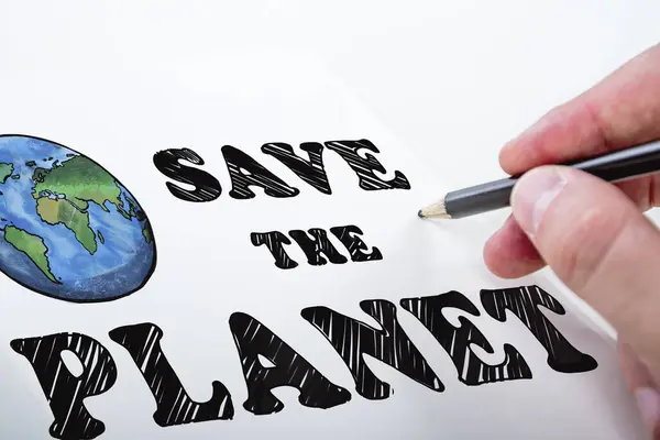 Close up of male hand drawing save the planet sketch on white background. Earth day concept
