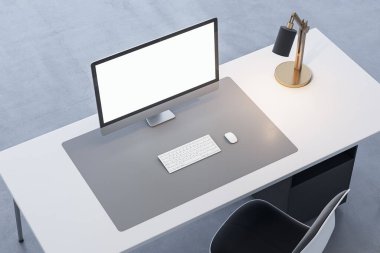 Ofis masasını boş beyaz bilgisayar monitörüyle kapatın ve bulanık arkaplandaki reklam, lamba ve klavyeniz için yer oluşturun. 3B Hazırlama