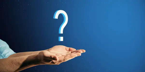 Close up of male hands holding abstract digital question mark on blue background with mock up place for your advertisement. Support and help concept